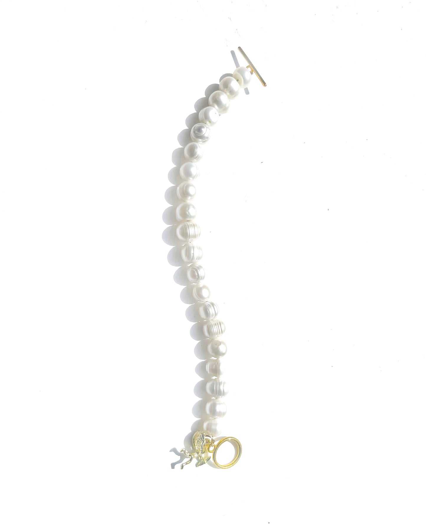 White pearl charm bracelet with dainty gold Cupid / cherub charm, classic white pearl jewelry, unique pearl jewelry, summer jewelry