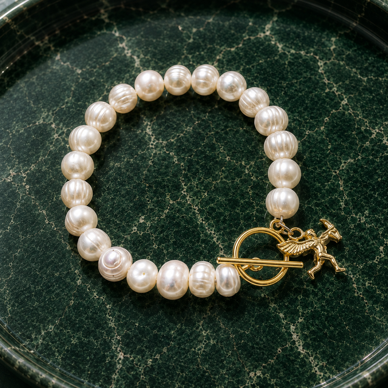 White pearl charm bracelet with dainty gold Cupid / cherub charm, classic white pearl jewelry, unique pearl jewelry, summer jewelry