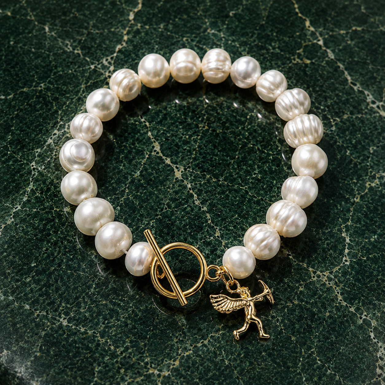 White pearl charm bracelet with dainty gold Cupid / cherub charm, classic white pearl jewelry, unique pearl jewelry, summer jewelry