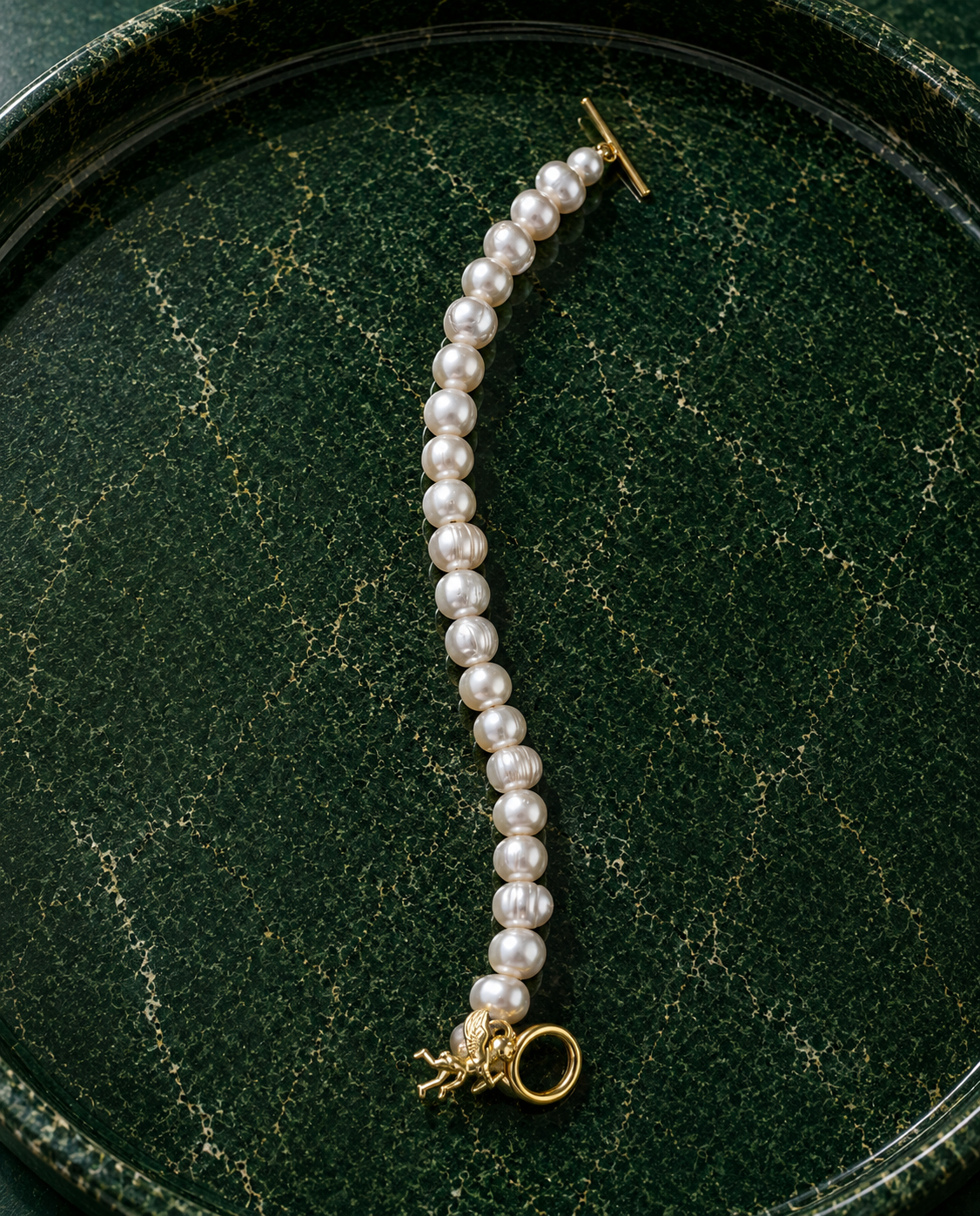White pearl charm bracelet with dainty gold Cupid / cherub charm, classic white pearl jewelry, unique pearl jewelry, summer jewelry