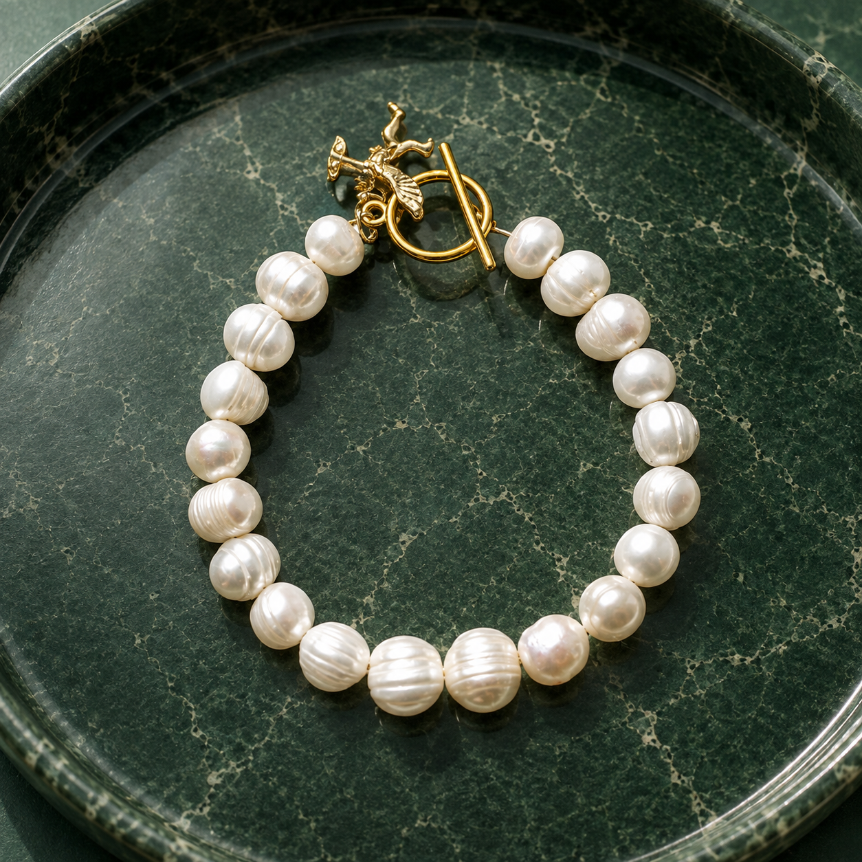 White pearl charm bracelet with dainty gold Cupid / cherub charm, classic white pearl jewelry, unique pearl jewelry, summer jewelry
