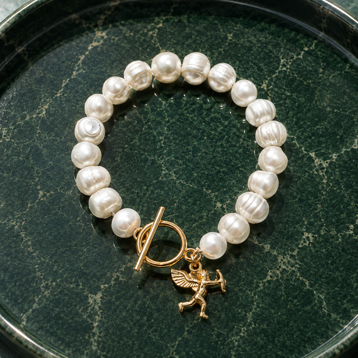 White pearl charm bracelet with dainty gold Cupid / cherub charm, classic white pearl jewelry, unique pearl jewelry, summer jewelry