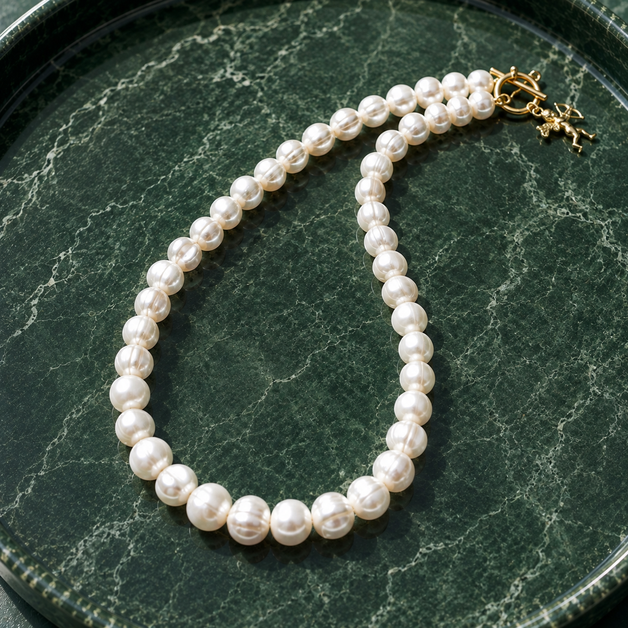 White pearl charm necklace with dainty gold Cupid / cherub charm, classic white pearl jewelry, unique pearl jewelry, summer jewelry