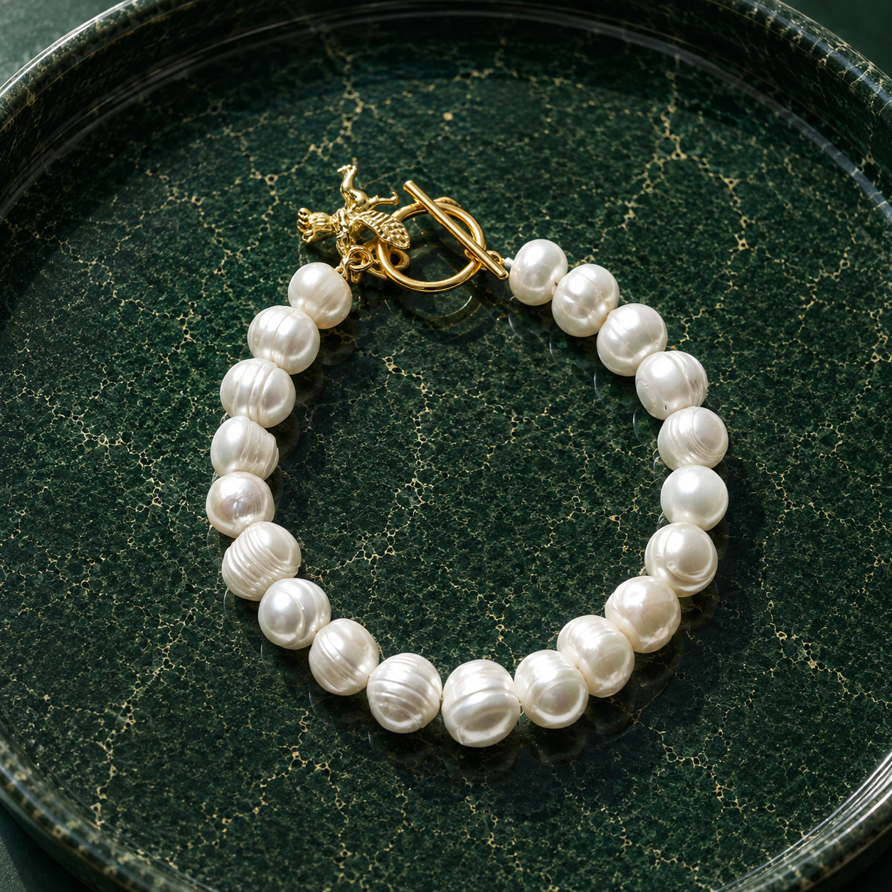 White pearl charm bracelet with dainty gold Cupid / cherub charm, classic white pearl jewelry, unique pearl jewelry, summer jewelry