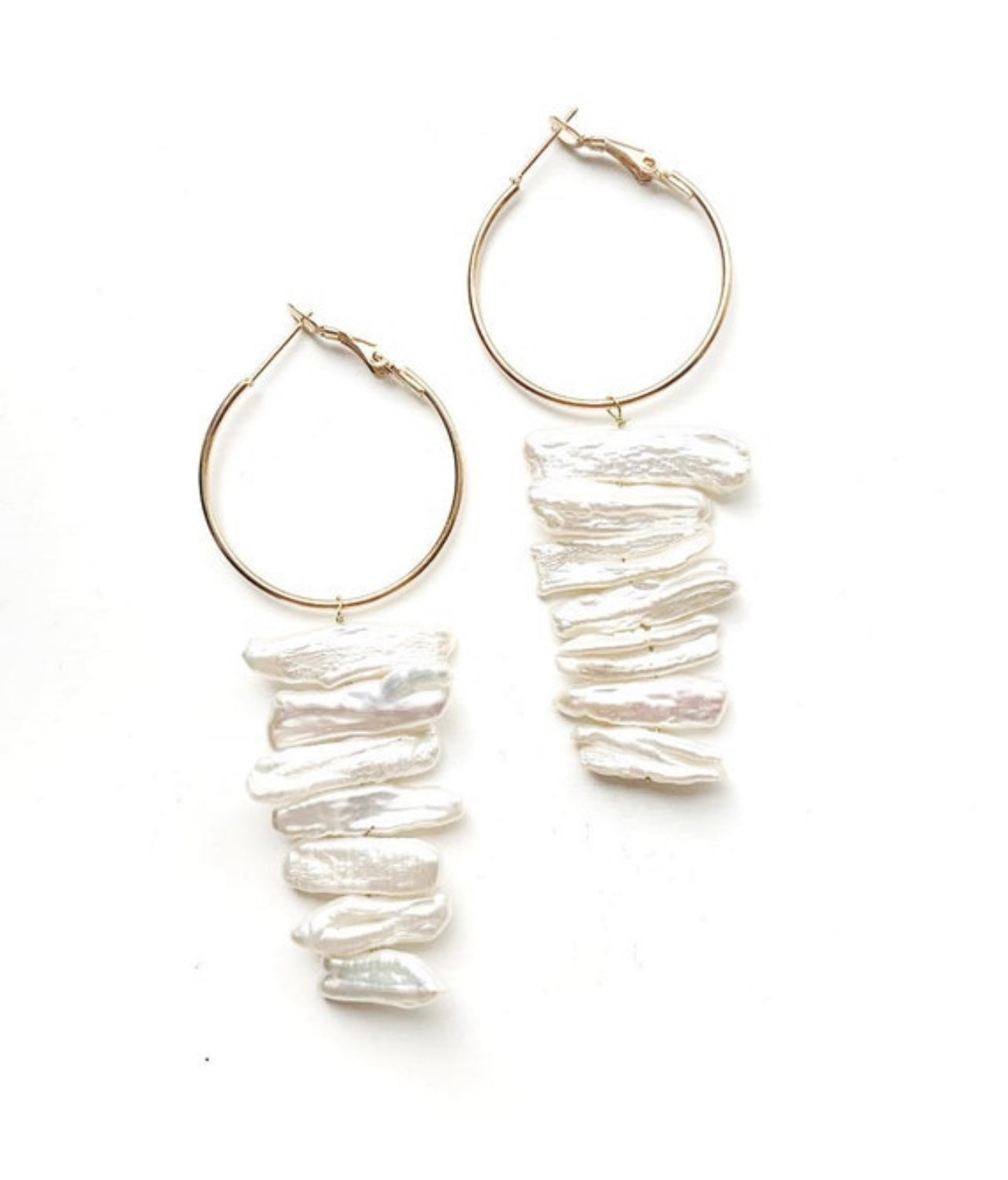 White stick pearl statement earrings, white pearl earrings, modern pearl earrings, jewelry trends 2022