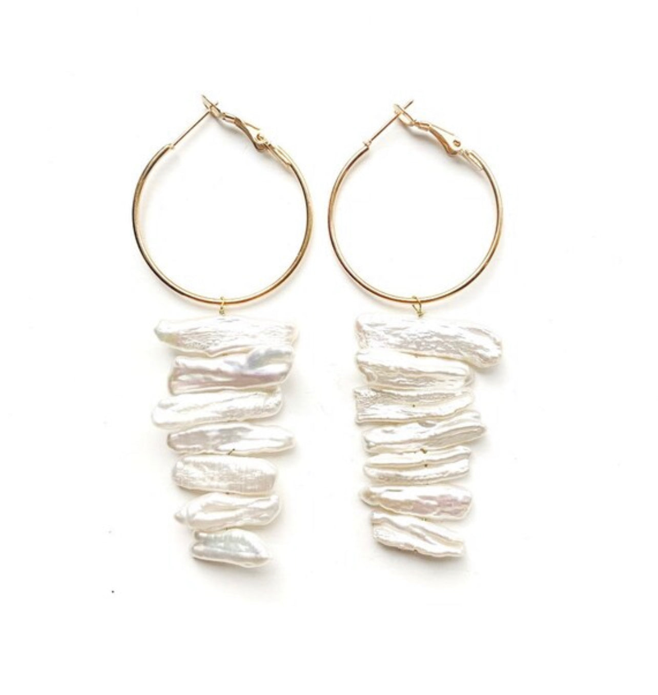 White stick pearl statement earrings, white pearl earrings, modern pearl earrings, jewelry trends 2022